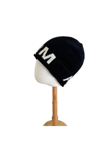 Black Ivory beanie with a folded cuff and contrasting block lettering