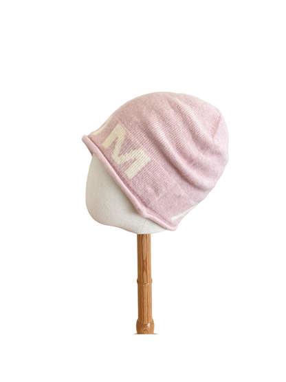 Pink Ivory beanie with a folded cuff and contrasting block lettering
