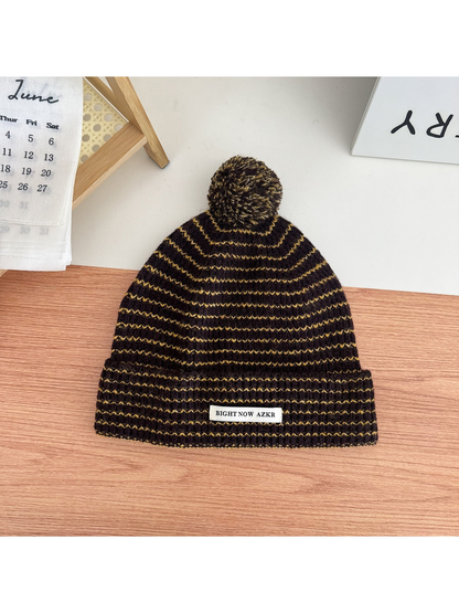 Dark Brown pom-pom beanie with wavy stripes and folded cuff