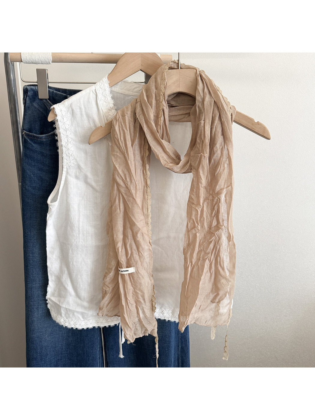 Beige crinkled scarf with lace edging, front view