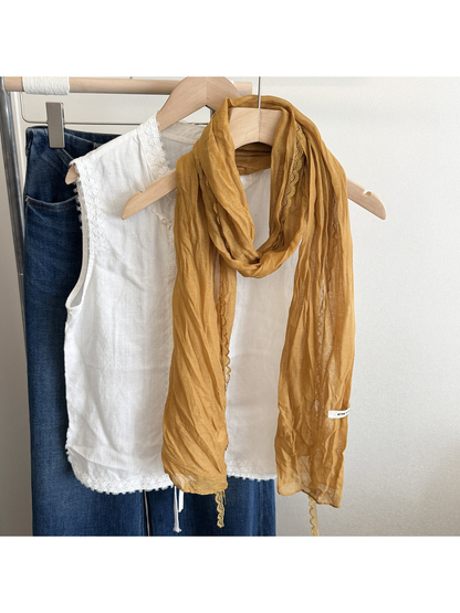 Mustard crinkled scarf with lace edging, front view