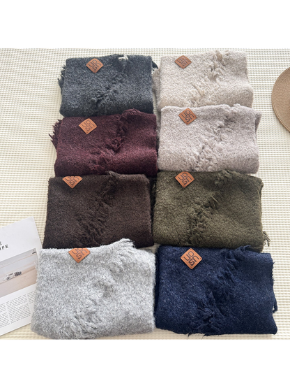 Multiple textured scarf colors arranged in a grid