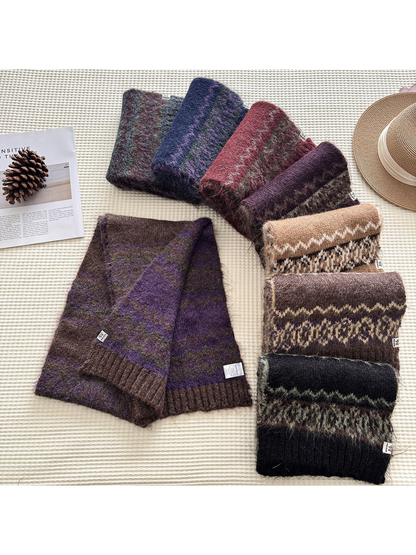 Patterned scarves in multiple colors arranged flat