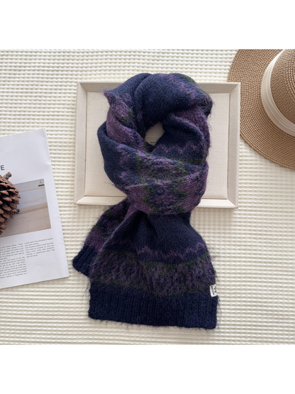 Navy patterned scarf in a looped display