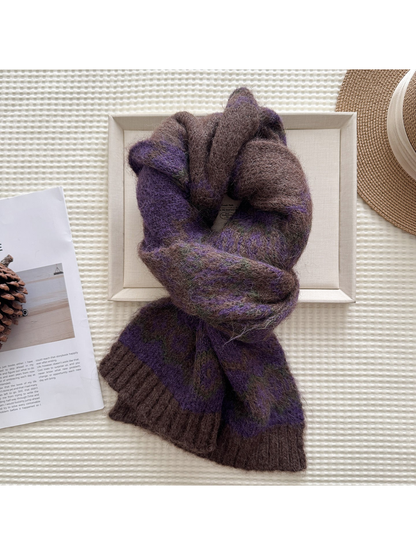 Purple patterned scarf in a looped display