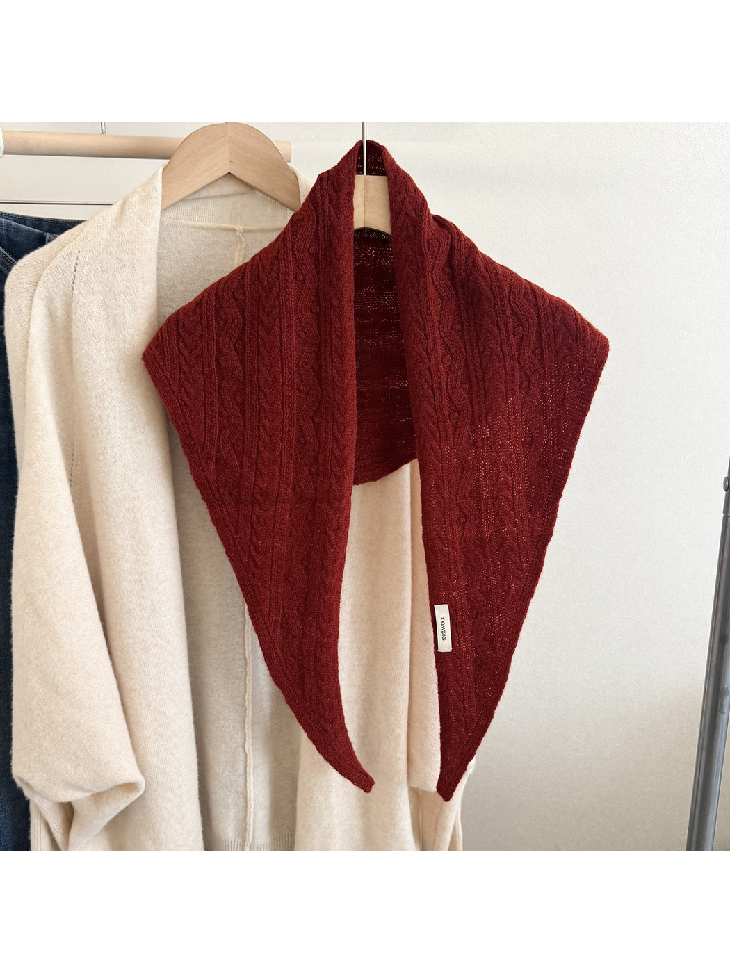 Burgundy textured triangle scarf displayed front-facing