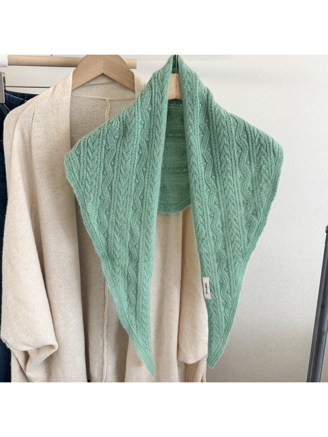 Mint textured triangle scarf displayed front-facing