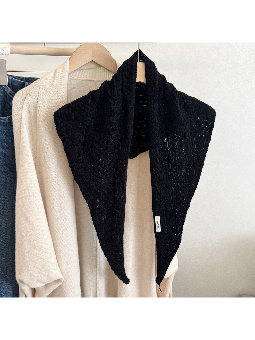 Black textured triangle scarf displayed front-facing