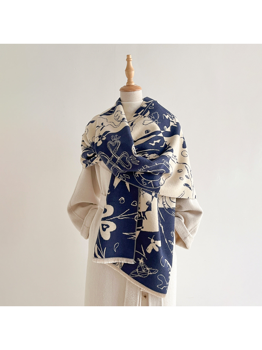 Patterned scarf wrapped around a mannequin neck