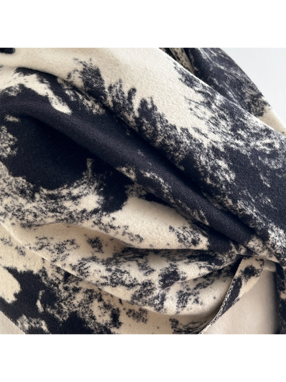 Close-up of the scarf's abstract textured pattern