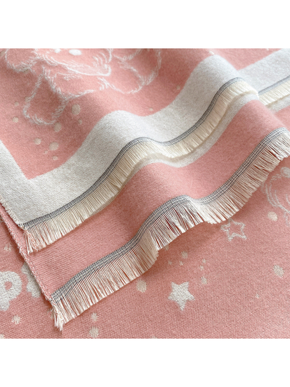Close-up of the scarf's layered fringed edges