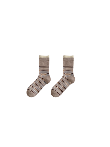Greige striped socks displayed on a plain background