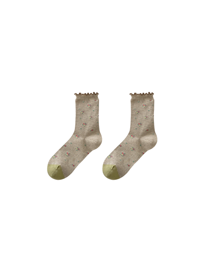 Floral Ruffle socks with scattered floral motifs and olive-green heel and toe panels
