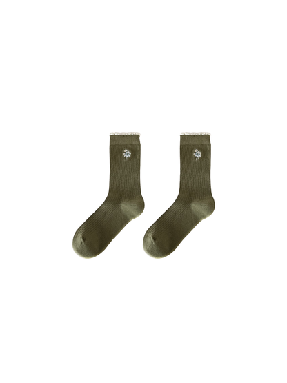 Floral Ruffle crew socks displayed side by side