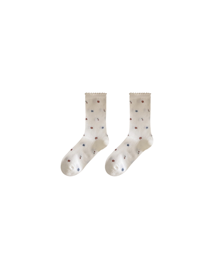 Ivory floral crew socks with scalloped ruffle cuffs, pair display