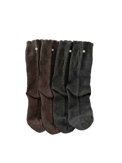Multiple colors of ruffled crew socks displayed together