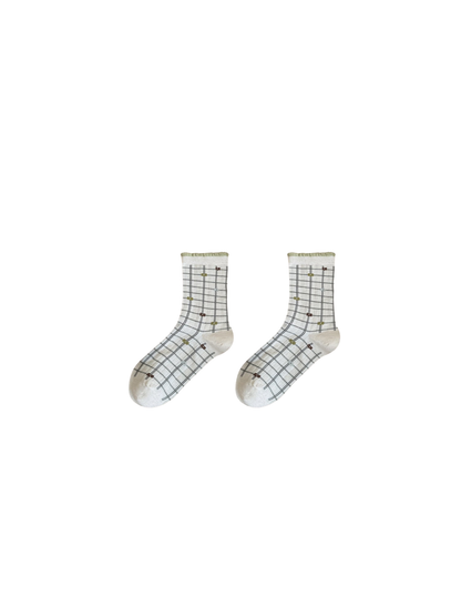 Plaid crew socks with a ruffled cuff