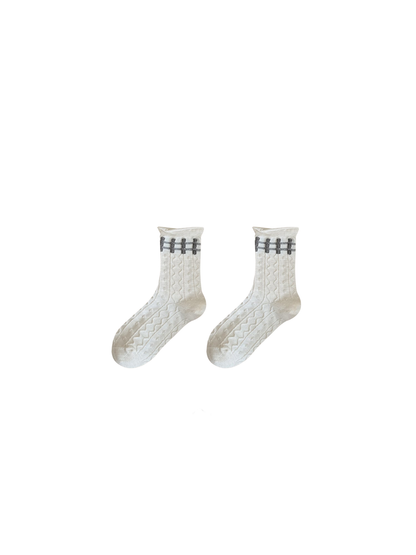 Cable crew socks with a raised cable-like texture
