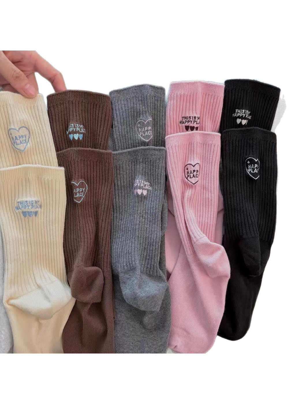 Ivory, coffee, gray, pink, and black ribbed socks displayed together