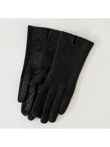 Black full-finger gloves with an ornate floral and paisley pattern