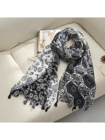 Black Medallion scarf with paisley and floral medallion patterns and tassel fringe, draped view