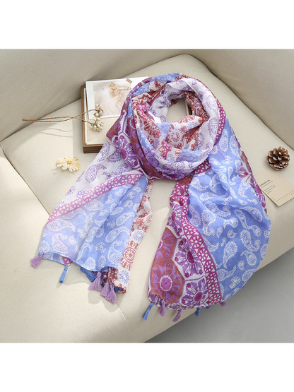 Light Purple scarf with paisley and floral patterns and tassel fringe, draped view