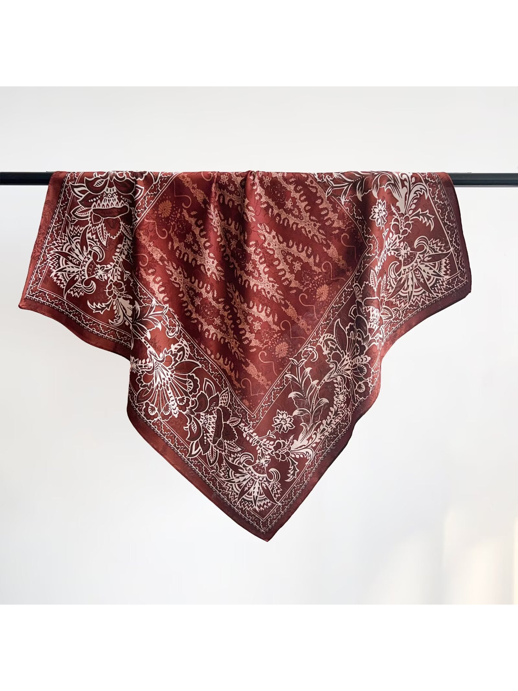 Burgundy square scarf with an ornamental paisley and floral pattern