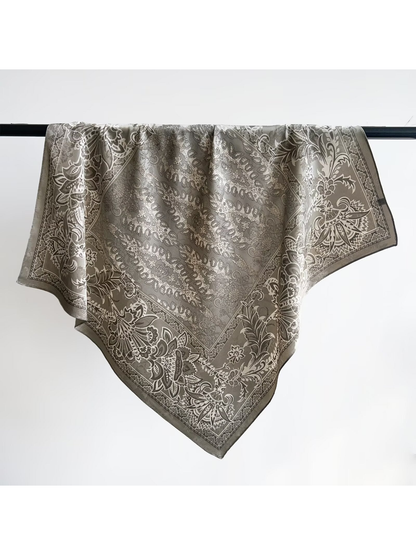 Gray square scarf with an ornamental paisley and floral pattern