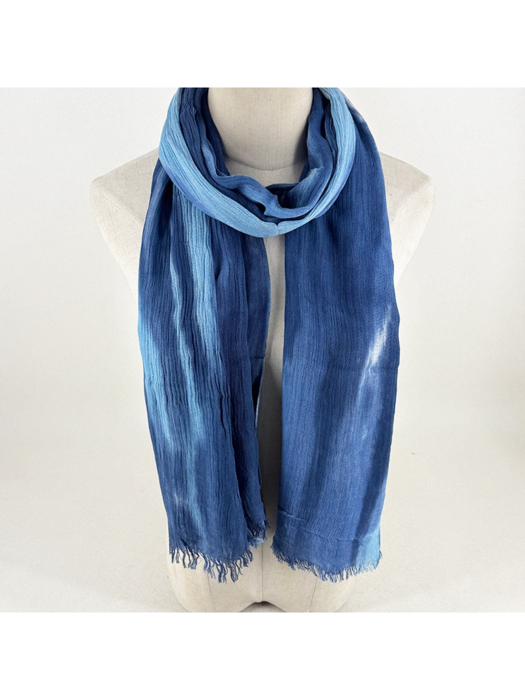 Scarvii Painterly Blue scarf folded showing blue and white painterly pattern