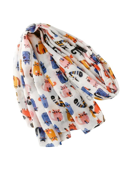 Detailed view of scarf edges and vibrant cat illustrations on Scarvii whimsical kitty scarf