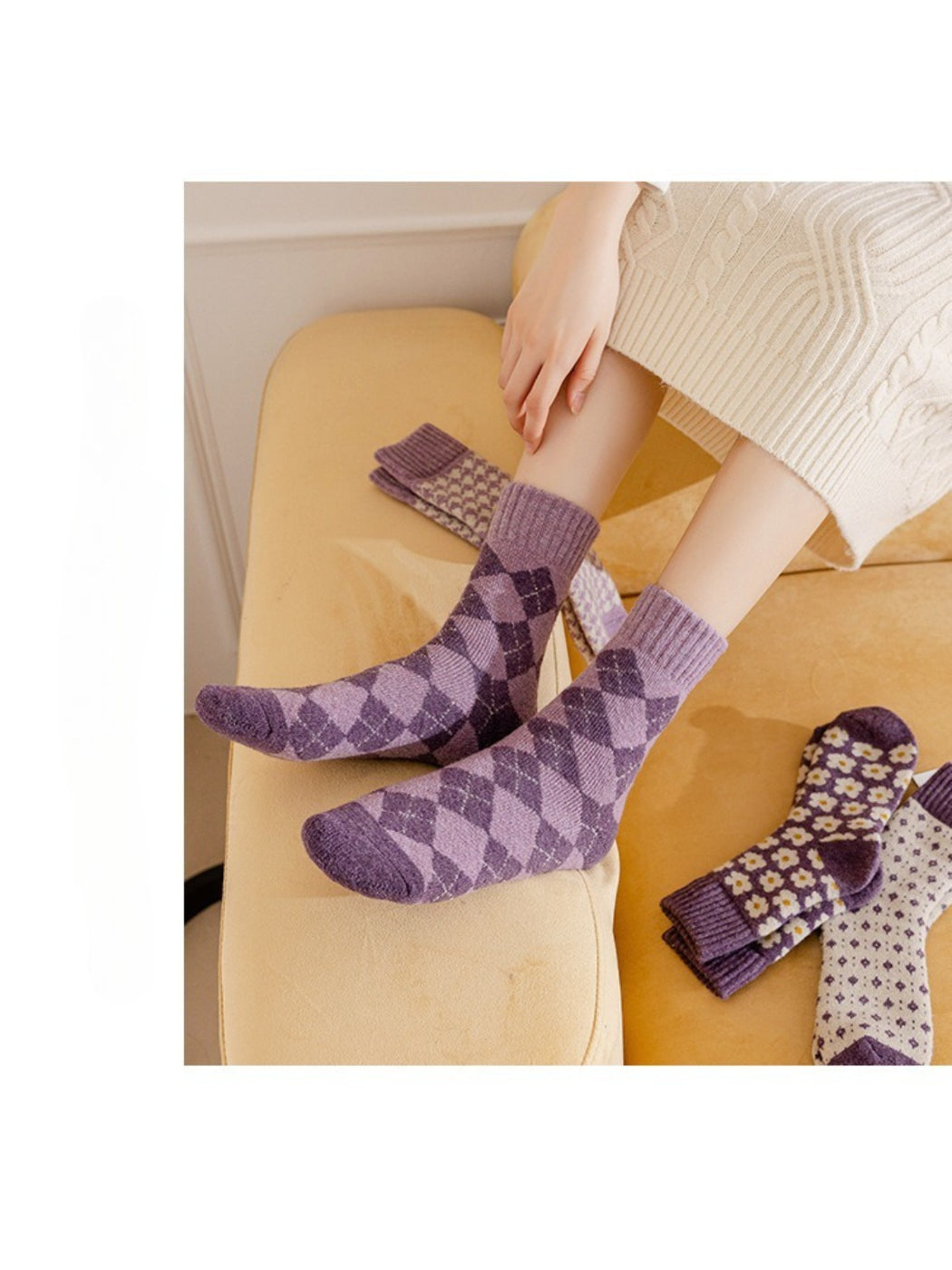 Rufia purple patterned crew socks styled on couch