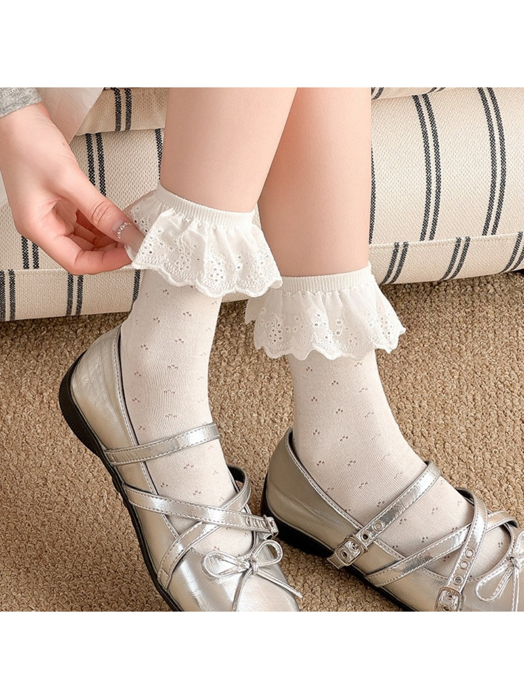 Model wearing Rufia lace ruffle trim crew socks with black shoes