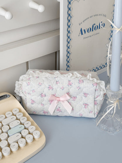 Side view of Cosbai lace makeup storage bag highlighting and bow