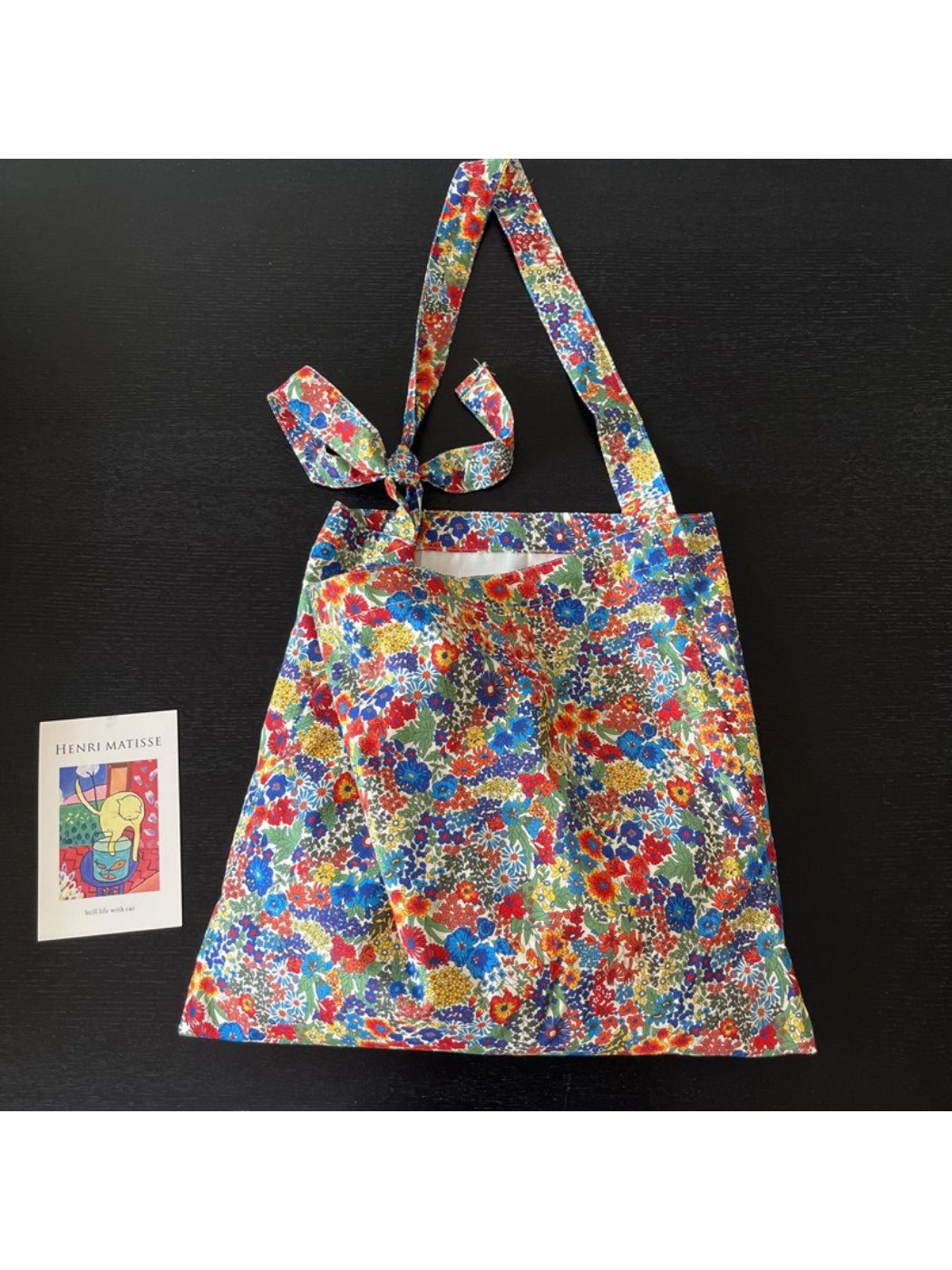 Cosbai tote bag filled with everyday items showcasing its spacious interior
