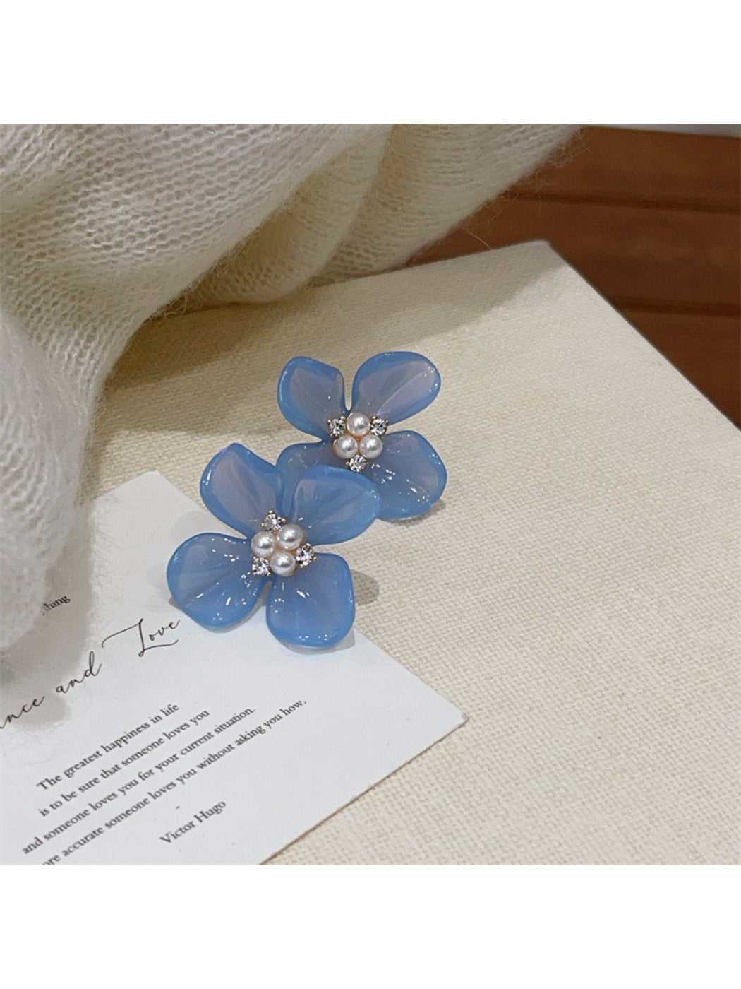 Earwish Rounded Petal Bloom Earrings worn by a model with short hair and neutral makeup
