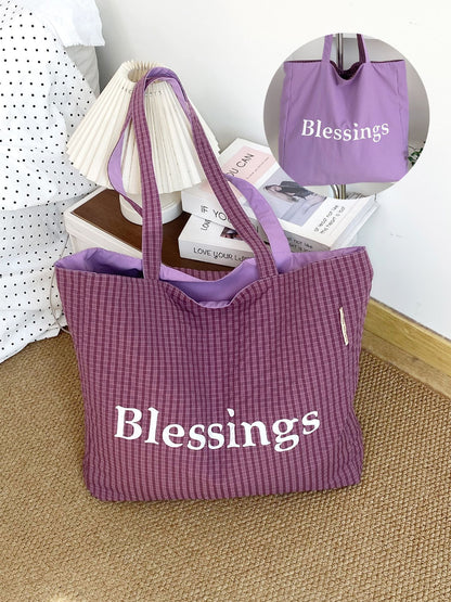 Cosbai reversible tote bag folded flat showing both black and white sides