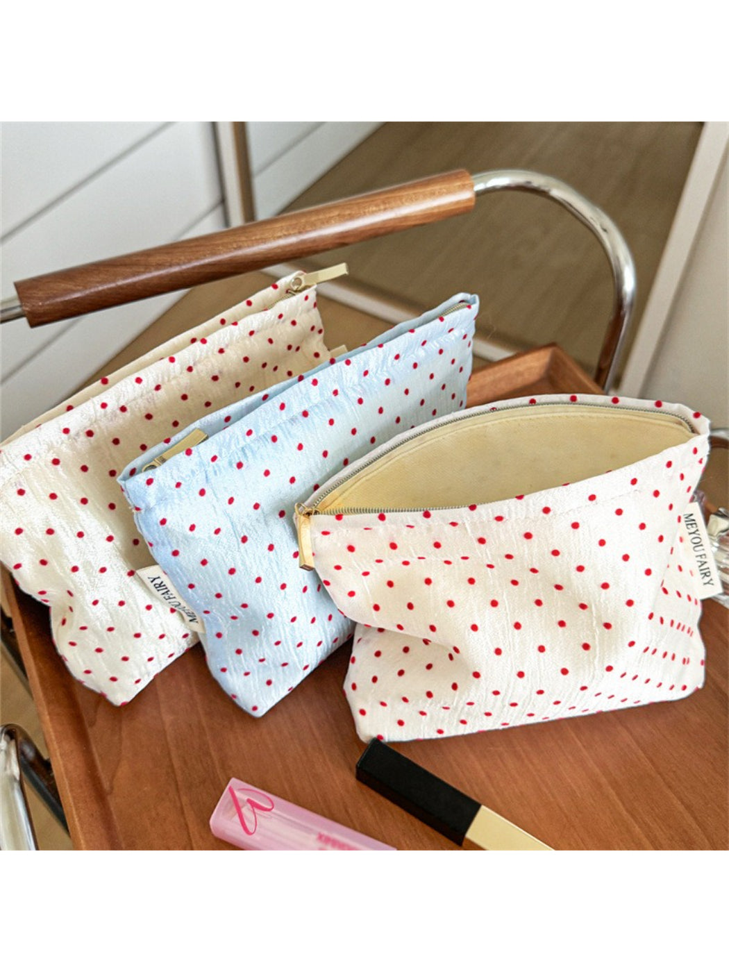 Cosbai Red Dot Cosmetic Bag side angle showing shape and red dot design