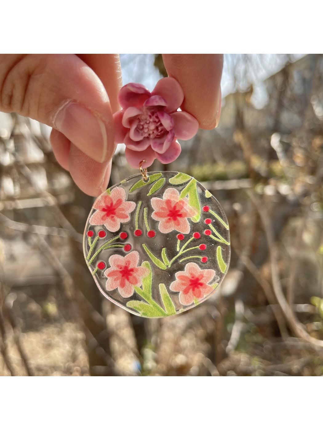 Side view of Earwish Garden Flower Disc Earrings showing disc shape and flower details