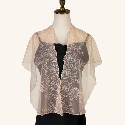 Scarvii floral wrap wrapped around model’s neck with soft flow and light texture