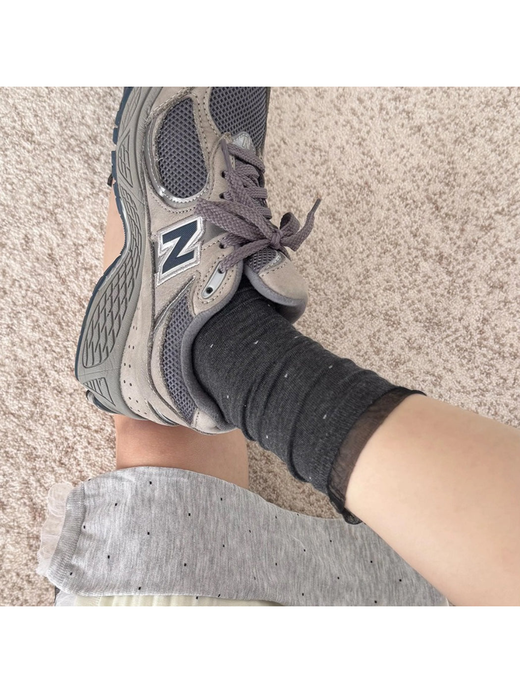 Rufia soft polka mesh socks styled with casual sneakers and rolled jeans