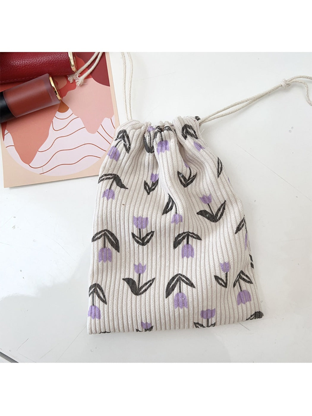 Cosbai floral drawstring pouch in mini size with colorful floral design on fabric