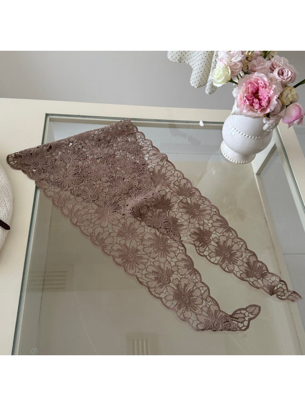 Flat lay of vintage crochet headband bandana highlighting intricate crochet design