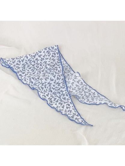 Scarvii Ditsy Floral Bandana Headscarf displayed on white surface with floral details visible