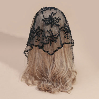 Haila embroidered lace veil head scarf folded on a white surface