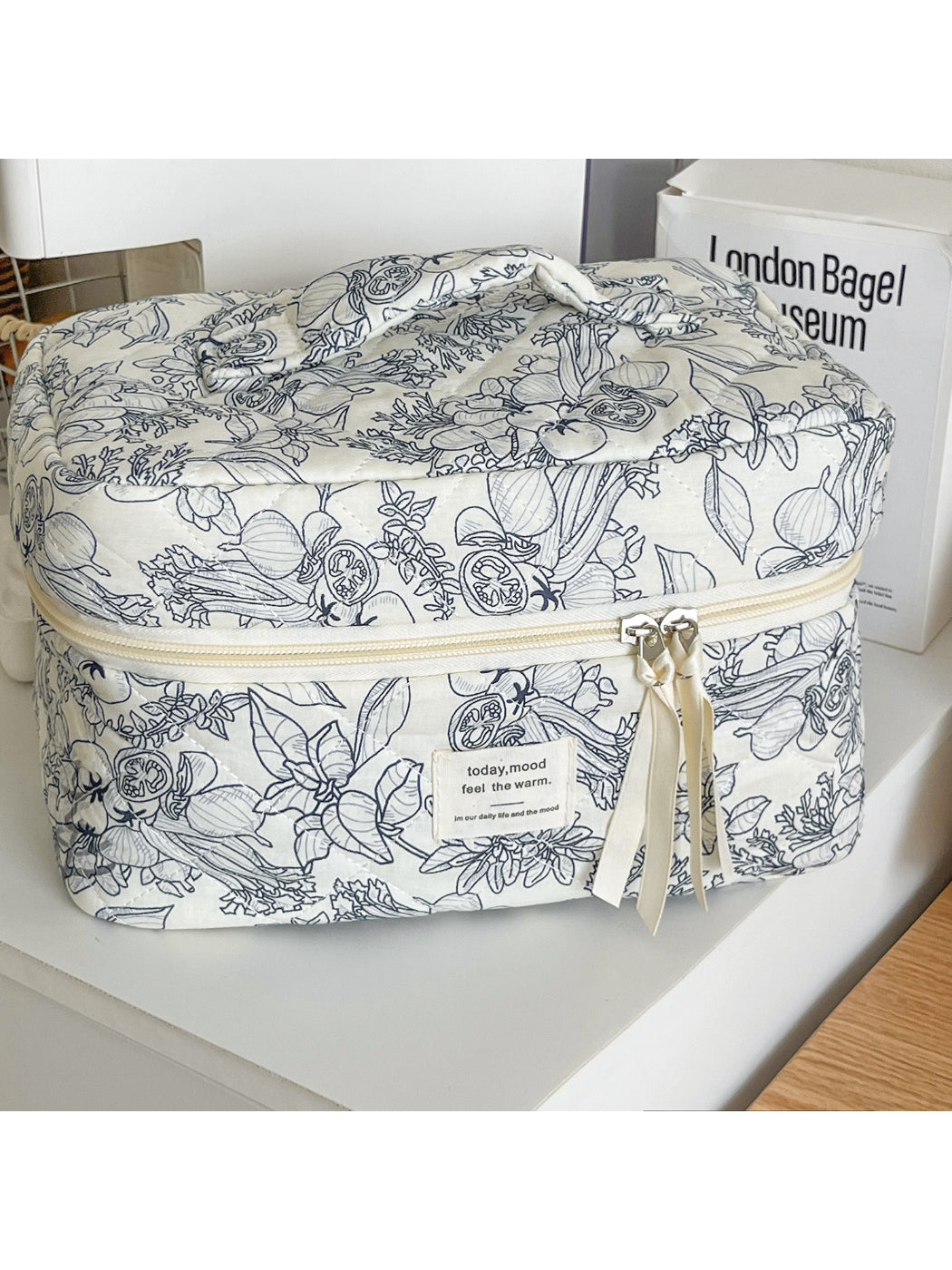 Cosbai travel cosmetic bag open showing spacious interior and lining