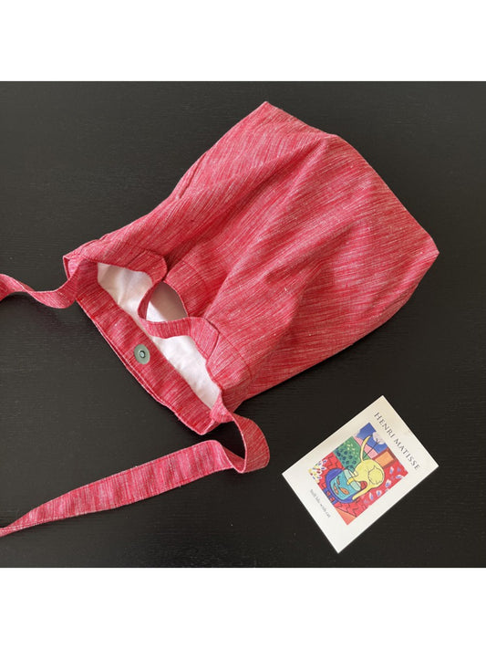 Close-up of Cosbai Soft Slouch Crossbody Bag showing textured and stitching