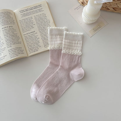 Model wearing Rufia soft ruffle trim knit crew socks with casual shoes