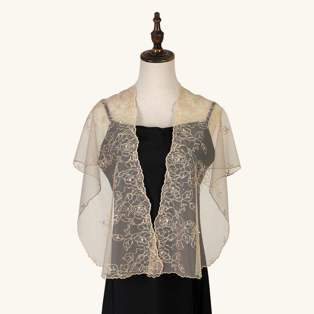Scarvii wrap styled as a headscarf featuring sheer fabric and floral print