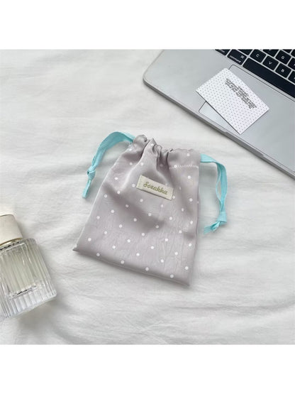 Cosbai Sweet Dot Drawstring Bag folded flat showing compact size