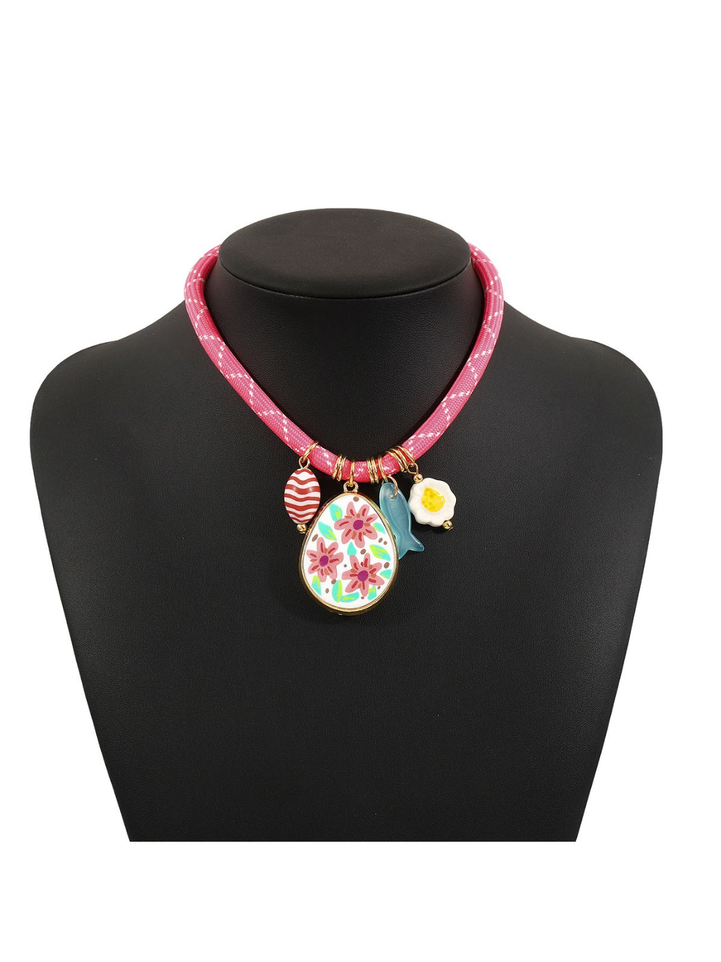 Colourful multi charm rope necklace styled with casual outfit on model